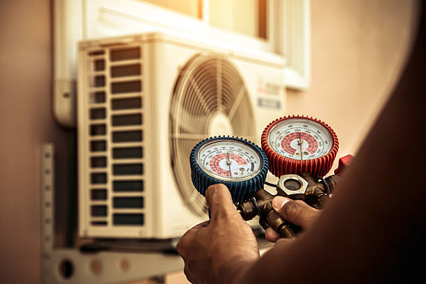Professional Air Conditioning Service technician working in Elloree, SC